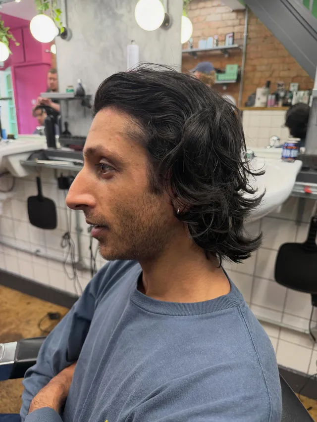 A subtle length restyle, fringe kept long